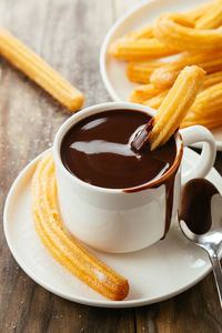 Close-up of coffee served on table