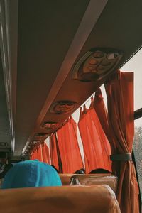 Low angle view of empty seats in bus