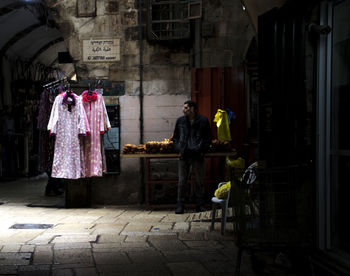 Rear view of people at market stall