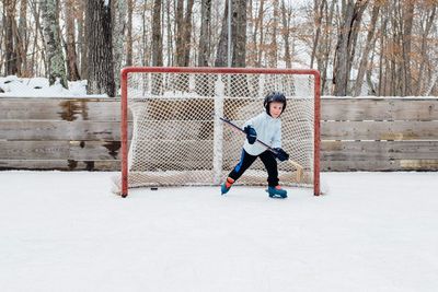 Portrait of boy playing ice hockey