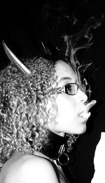 Close-up of woman wearing eyeglasses