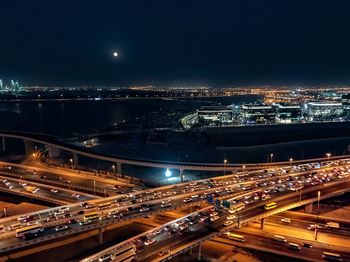 High angle view of light trails on road in city at night