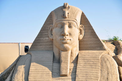 Low angle view of statue against clear sky