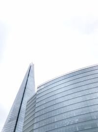 Low angle view of skyscraper against sky