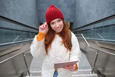 Young woman using mobile phone