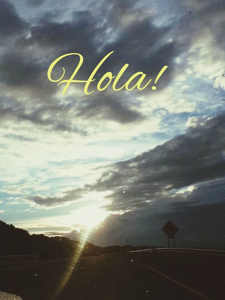 sky, cloud - sky, text, guidance, western script, road, cloudy, communication, road sign, sign, transportation, cloud, information sign, tranquility, sunset, nature, street, silhouette, outdoors, scenics