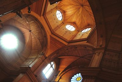 Low angle view of illuminated ceiling