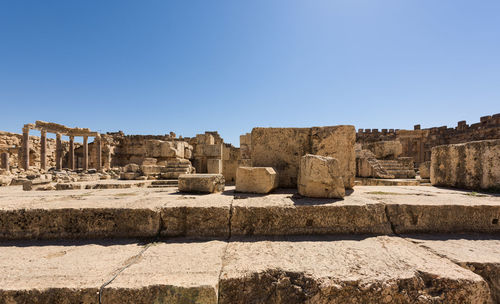 Old ruins against clear blue sky