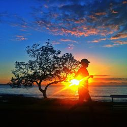 Scenic view of sea at sunset