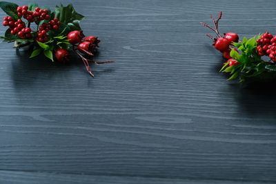 High angle view of red berries on table