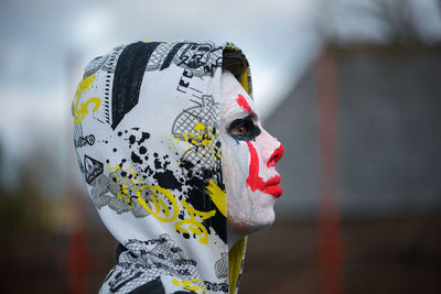 Close-up of boy with face paint