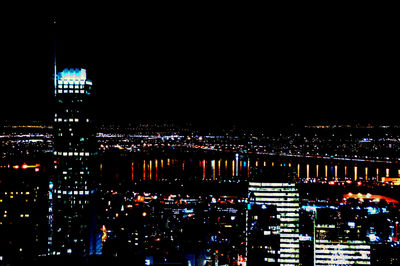 Illuminated cityscape at night