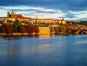 River in city against sky