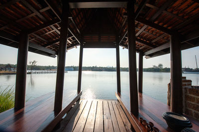 Interior of observation point over river against sky