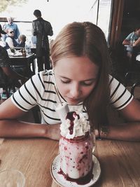 Woman holding ice cream