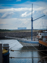 Boats in sea against sky