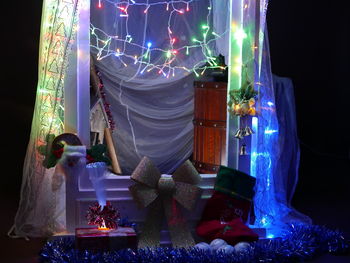 Close-up of illuminated christmas tree at night