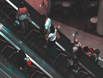 High angle view of people on escalator