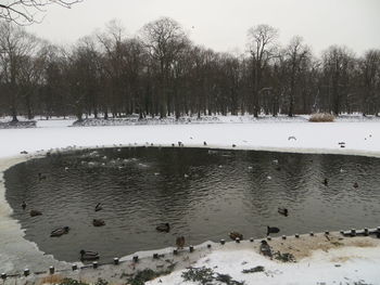 Scenic view of frozen lake against sky