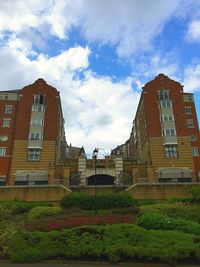 Exterior of building against cloudy sky