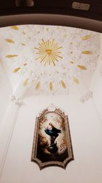 Low angle view of buddha statue