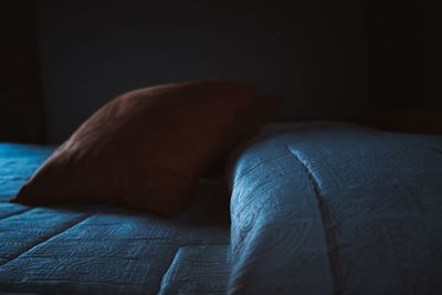 Close-up of blanket on bed at home