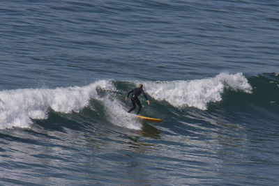 Man surfing in sea