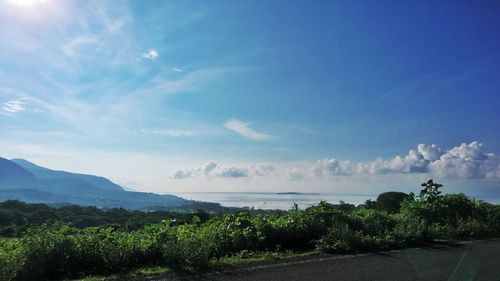 Scenic view of sea against blue sky