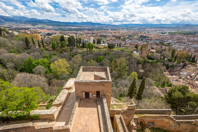 High angle view of castle and cityscape