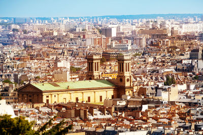 High angle view of buildings against clear sky