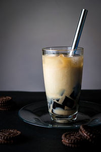 Close-up of coffee in glass on table