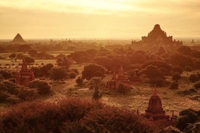 Ruins of temple against sky during sunset