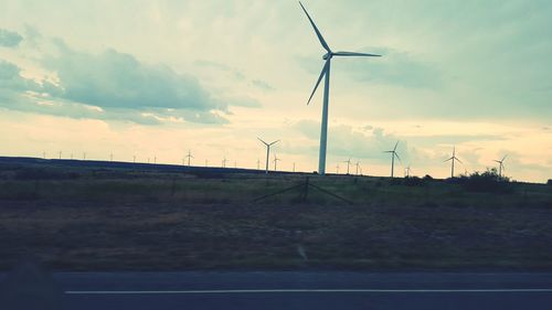 Wind turbines on field