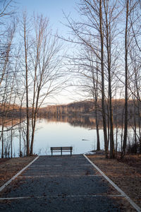 Scenic view of lake against sky during winter