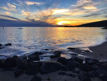 Scenic view of sea against sky during sunset