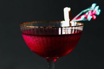 Close-up of drink against black background