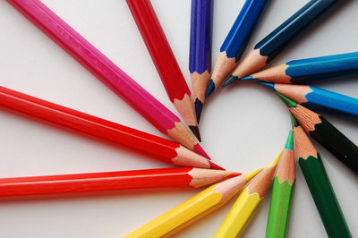 Color pencils arranged in a creative way