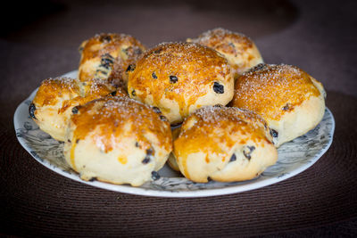 Close-up of bagels in plate on table