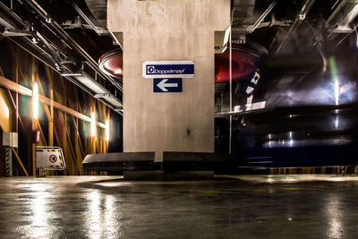 Illuminated sign board in city at night
