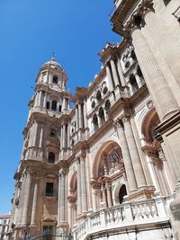 Low angle view of cathedral against sky in city