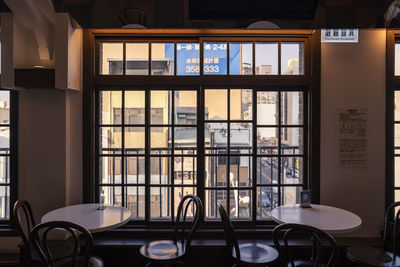 Empty chairs and table in restaurant