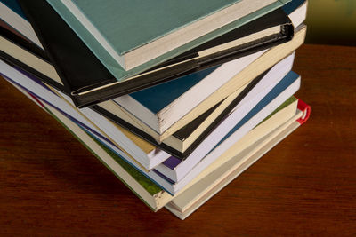 Close-up of background stack of old used books. pile of vintage old books. back to school copy space