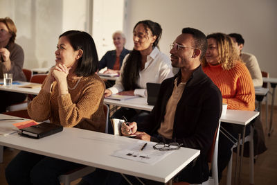 Group of adults sitting in class