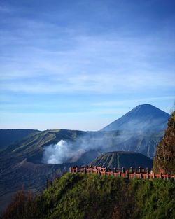 View of volcanic mountain against cloudy sky