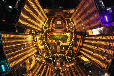 Directly above view of illuminated buildings in city at night