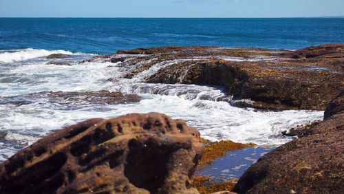 Scenic view of sea against clear sky