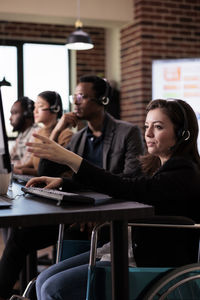 Business colleagues working in office