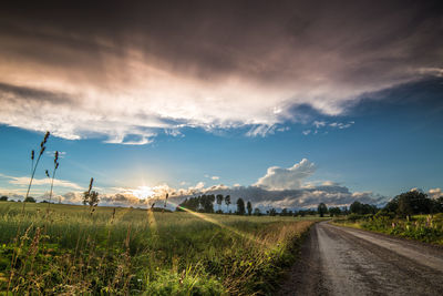 Scenic view of landscape against blue sky