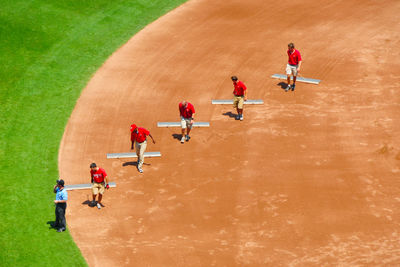 High angle view of people playing soccer on field