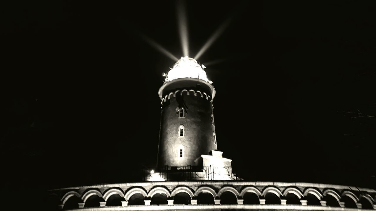 LOW ANGLE VIEW OF ILLUMINATED BUILDING